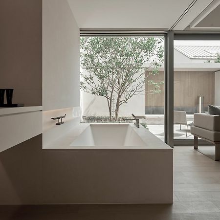 Отель Alila Wuzhen Тунсян Экстерьер фото